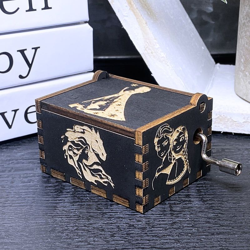 Load image into Gallery viewer, The film&#39;s captivating storyline, combined with the unforgettable song &quot;Let It Go,&quot; never fails to leave a lasting impression on anyone who watches. A delightful music box is available, allowing you to relive the magic wherever you go!
