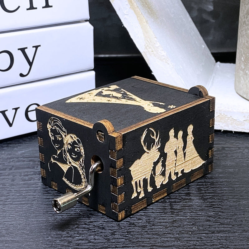 Load image into Gallery viewer, The film&#39;s captivating storyline, combined with the unforgettable song &quot;Let It Go,&quot; never fails to leave a lasting impression on anyone who watches. A delightful music box is available, allowing you to relive the magic wherever you go!
