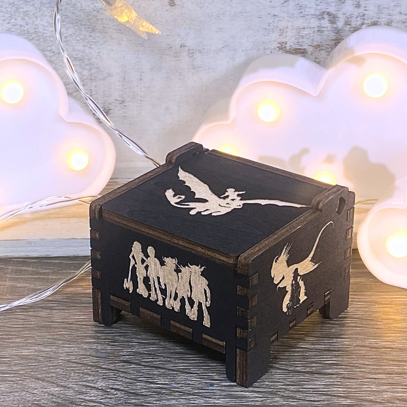 Load image into Gallery viewer, Looking for a gift for a How to Train Your Dragon fan? MarketPlacefad offers unique wooden music boxes that combine art and music perfectly. Each box produces a beautiful melody that will transport you to a world of pure delight.
