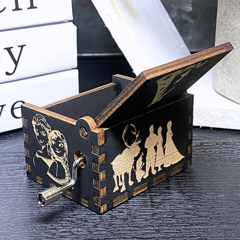 Load image into Gallery viewer, The film&#39;s captivating storyline, combined with the unforgettable song &quot;Let It Go,&quot; never fails to leave a lasting impression on anyone who watches. A delightful music box is available, allowing you to relive the magic wherever you go!
