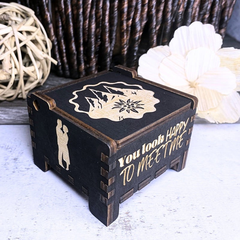Load image into Gallery viewer, The Edelweiss music box is a stunning work of art with exceptional sound quality. The intricate designs, inspired by musical movements, are a testament to the attention to detail and craftsmanship that has gone into creating this masterpiece.
