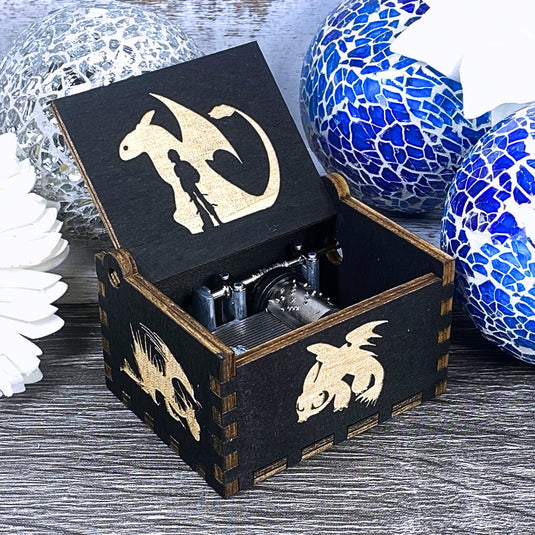 Looking for a gift for a How to Train Your Dragon fan? MarketPlacefad offers unique wooden music boxes that combine art and music perfectly. Each box produces a beautiful melody that will transport you to a world of pure delight.