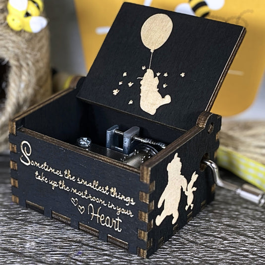 Embark on an adventure with classic Winnie-the-Pooh characters - Christopher Robin, Tigger, Piglet, Roo, and Eeyore - this exceptional music box lets you share these beautiful qualities with your loved one, buy one today!