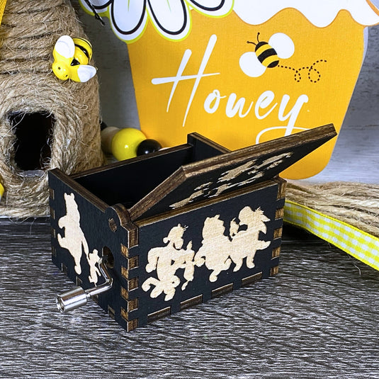 Embark on an adventure with classic Winnie-the-Pooh characters - Christopher Robin, Tigger, Piglet, Roo, and Eeyore - this exceptional music box lets you share these beautiful qualities with your loved one, buy one today!
