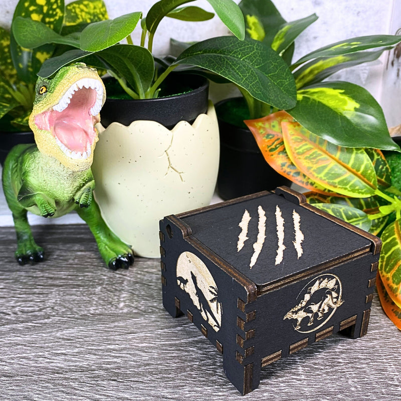 Load image into Gallery viewer, Jurassic Park: Join Alan Grant, Ellie Sattler, and Ian Malcolm on a tour of an island theme park filled with genetically resurrected dinosaurs. Get ready for an adventure with our iconic music box by MarketPlaceFad - Malaura Ashley.
