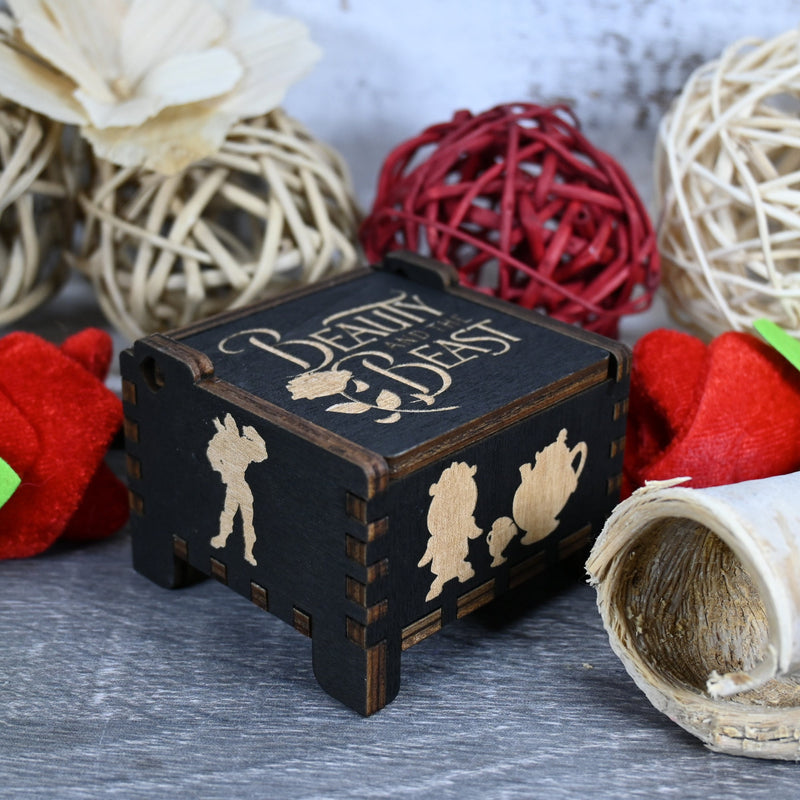 Load image into Gallery viewer, Beauty and the Beast is a timeless masterpiece that has entranced audiences for generations. The music box, featuring the iconic tune Tale as Old as Time, is as enchanting as the film itself.
