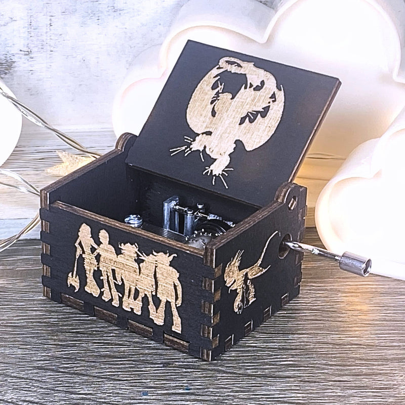 Load image into Gallery viewer, Looking for a gift for a How to Train Your Dragon fan? MarketPlacefad offers unique wooden music boxes that combine art and music perfectly. Each box produces a beautiful melody that will transport you to a world of pure delight.
