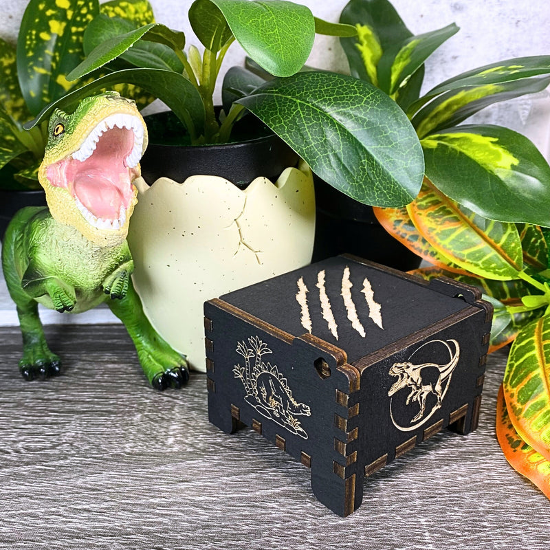 Load image into Gallery viewer, Jurassic Park: Join Alan Grant, Ellie Sattler, and Ian Malcolm on a tour of an island theme park filled with genetically resurrected dinosaurs. Get ready for an adventure with our iconic music box by MarketPlaceFad - Malaura Ashley.
