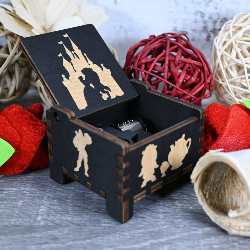 Load image into Gallery viewer, Beauty and the Beast is a timeless masterpiece that has entranced audiences for generations. The music box, featuring the iconic tune Tale as Old as Time, is as enchanting as the film itself.
