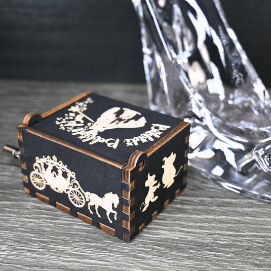 Experience the enchanting world of Cinderella with a music box that captures the tale in all its glory. As you turn the key, the sweet melody fills the air. This music box is a delightful treat for yourself or a loved one.