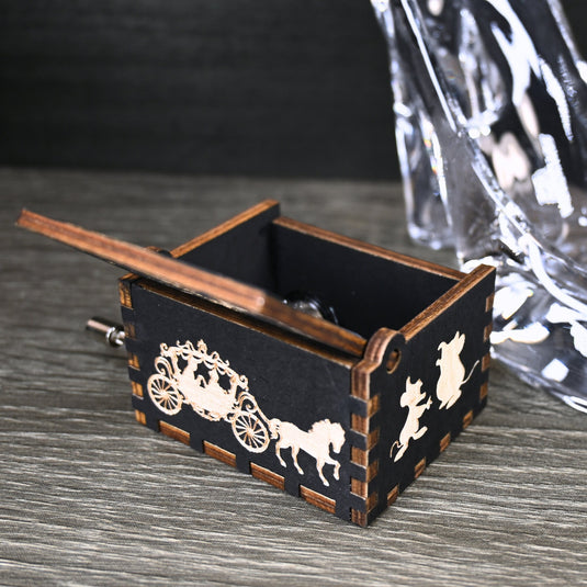Experience the enchanting world of Cinderella with a music box that captures the tale in all its glory. As you turn the key, the sweet melody fills the air. This music box is a delightful treat for yourself or a loved one.