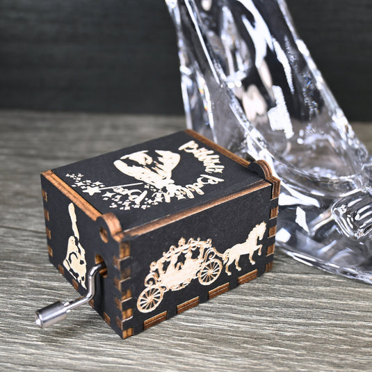 Experience the enchanting world of Cinderella with a music box that captures the tale in all its glory. As you turn the key, the sweet melody fills the air. This music box is a delightful treat for yourself or a loved one.