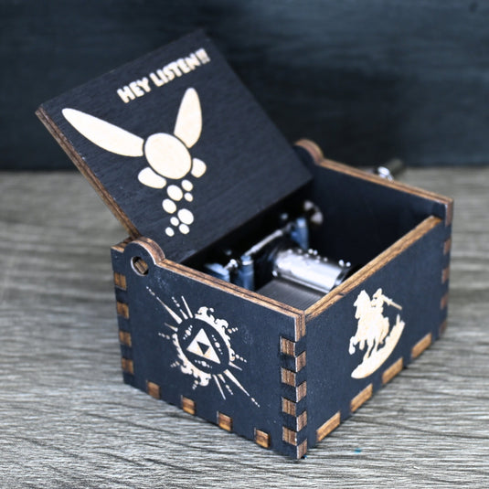 Are you looking for a one-of-a-kind gift for someone who adores Zelda? If so, you must check out the wooden music boxes at MarketPlacefad. These boxes are not just a source of melodious tunes but a work of art, handcrafted with attention to detail.