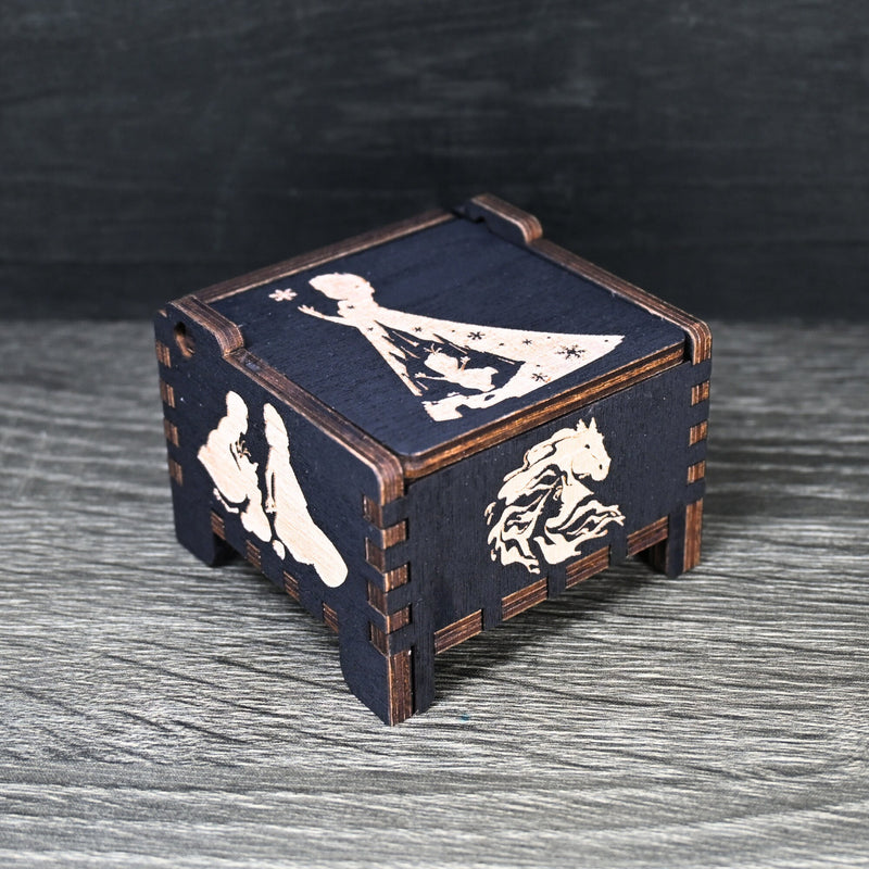 Load image into Gallery viewer, The box&#39;s charming design and ethereal melody make it the perfect keepsake for any Frozen enthusiast.
