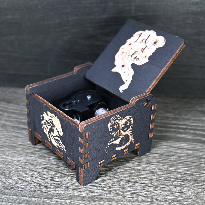 Load image into Gallery viewer, The box&#39;s charming design and ethereal melody make it the perfect keepsake for any Frozen enthusiast.

