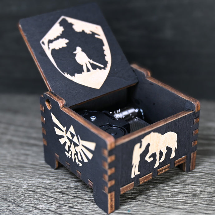 Are you looking for a one-of-a-kind gift for someone who adores Zelda? If so, you must check out the wooden music boxes at MarketPlacefad. These boxes are not just a source of melodious tunes but a work of art, handcrafted with attention to detail.