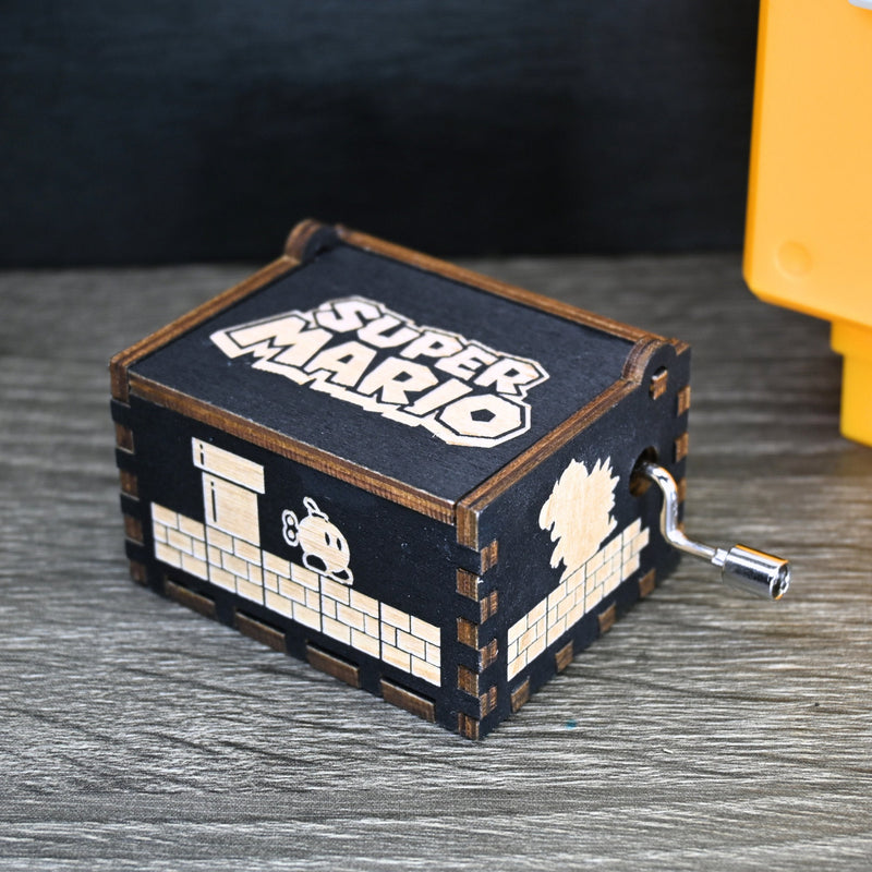 Load image into Gallery viewer, Enter the enchanting world of Mario with your very own music box! Embark on a thrilling adventure filled with excitement and challenges. Explore landscapes, overcome obstacles, and discover hidden treasures as you journey through this magical realm.
