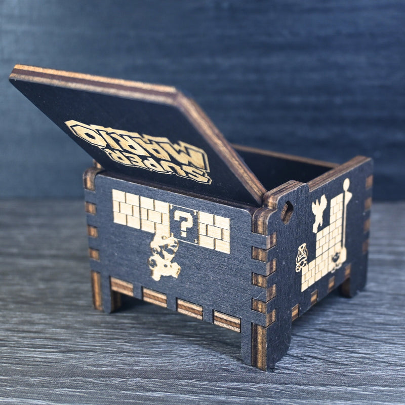 Load image into Gallery viewer, Enter the enchanting world of Mario with your very own music box! Embark on a thrilling adventure filled with excitement and challenges. Explore landscapes, overcome obstacles, and discover hidden treasures as you journey through this magical realm.
