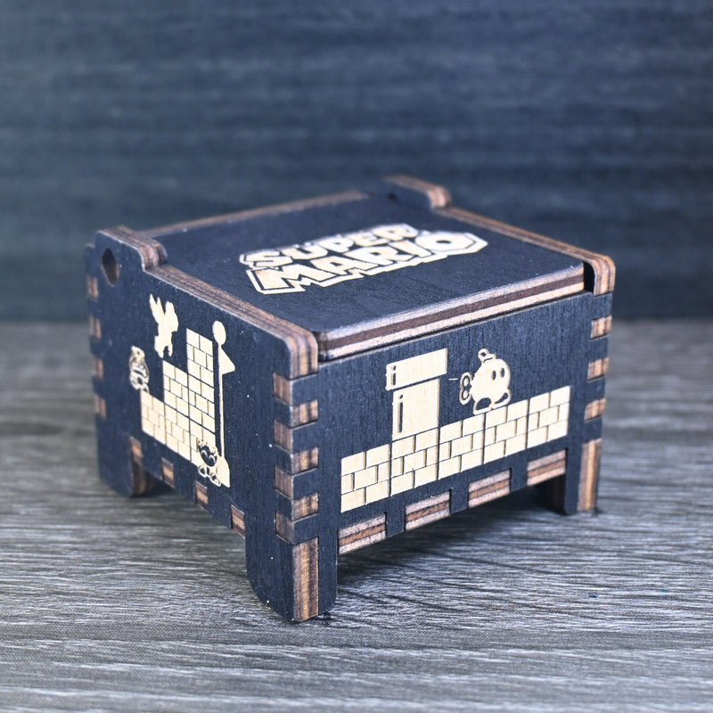 Load image into Gallery viewer, Enter the enchanting world of Mario with your very own music box! Embark on a thrilling adventure filled with excitement and challenges. Explore landscapes, overcome obstacles, and discover hidden treasures as you journey through this magical realm.
